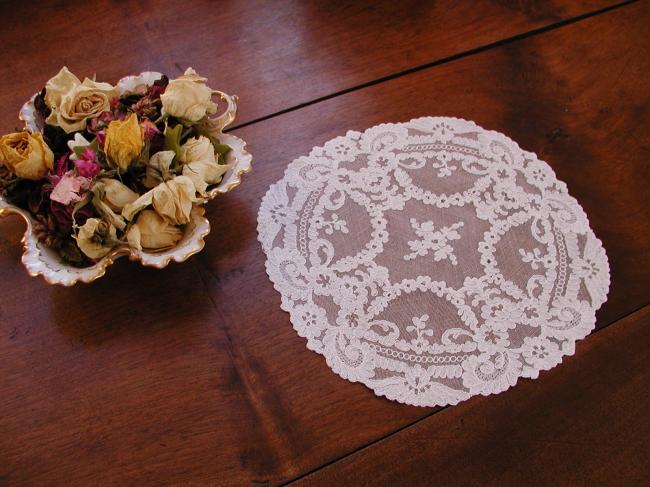 Stunning doily in net lace with needle run embroidered flowers 1900