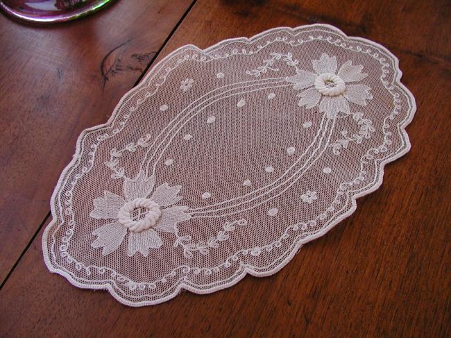 Superb little oval doily in net needle run lace 1920