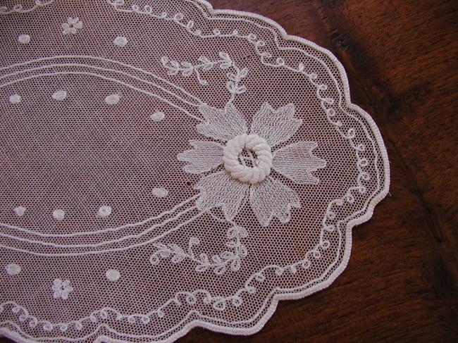 Superb little oval doily in net needle run lace 1920