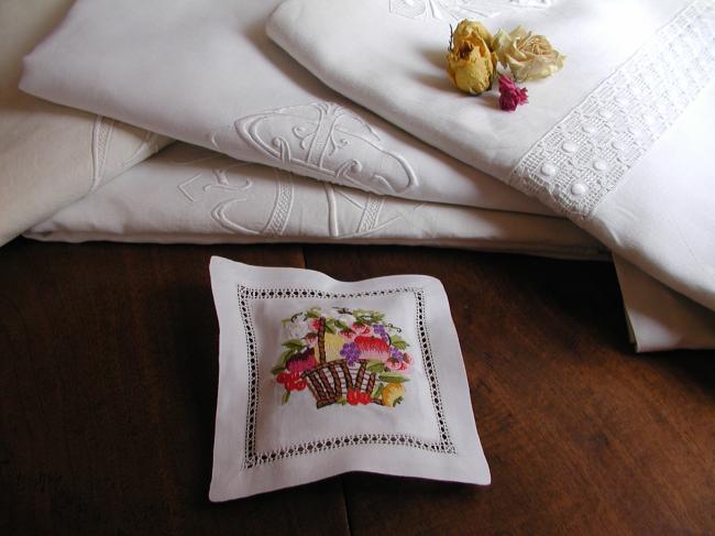 Romantic lavander sachet with hand-embroidered basket of flowers