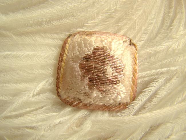  Lovely button in square bent shape in cream and old pink color 1950