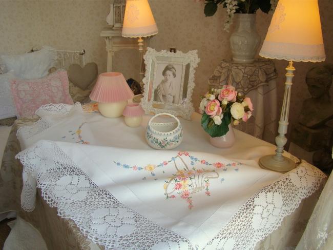 Really pretty tablecloth with hand-embroidered baskets of flowers and lace