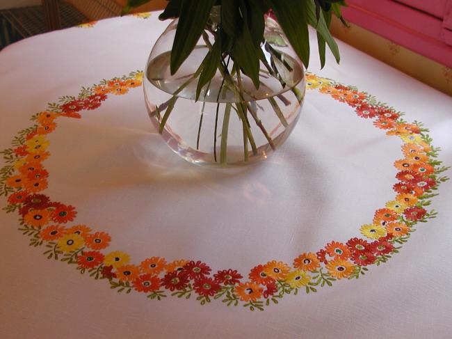 Gorgeous tablecloth with hand-embroidered crown of orange flowers