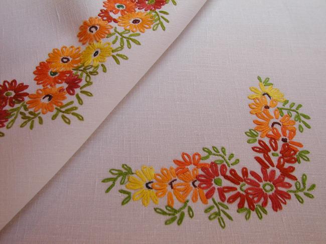 Gorgeous tablecloth with hand-embroidered crown of orange flowers