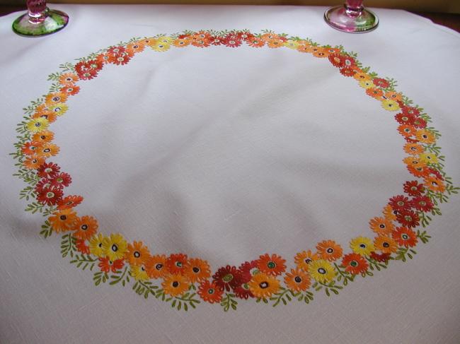 Gorgeous tablecloth with hand-embroidered crown of orange flowers