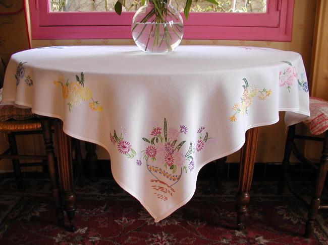 So sweet tablcloth with hand-embroidered vases of flowers