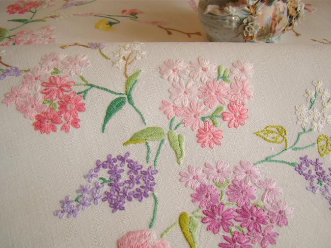 Enchanting small tablecloth with hand-embroidered flowers and sweet peas