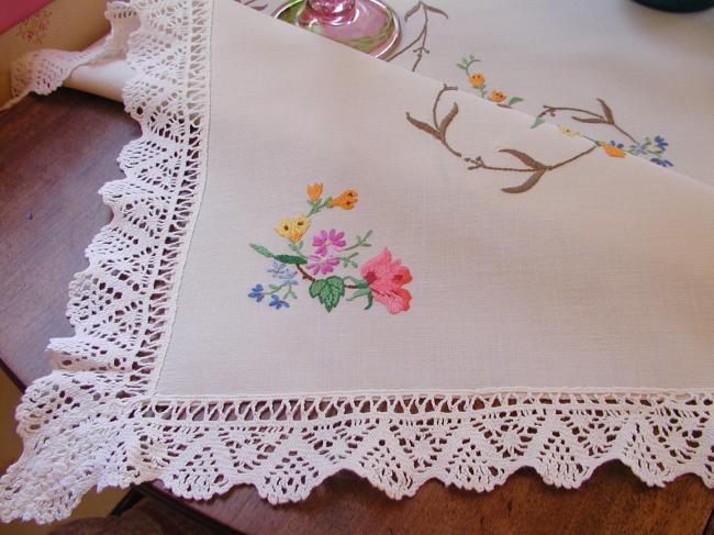 Striking tablecloth with hand-embroidered summer flowers and hand-done lace