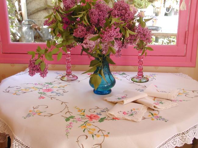 Striking tablecloth with hand-embroidered summer flowers and hand-done lace