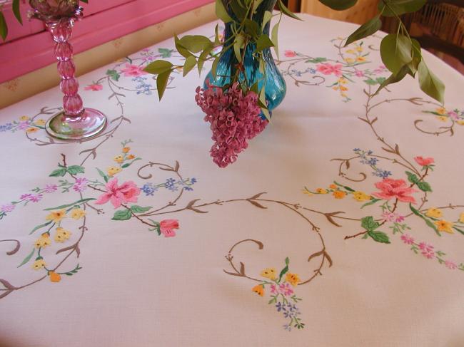 Striking tablecloth with hand-embroidered summer flowers and hand-done lace