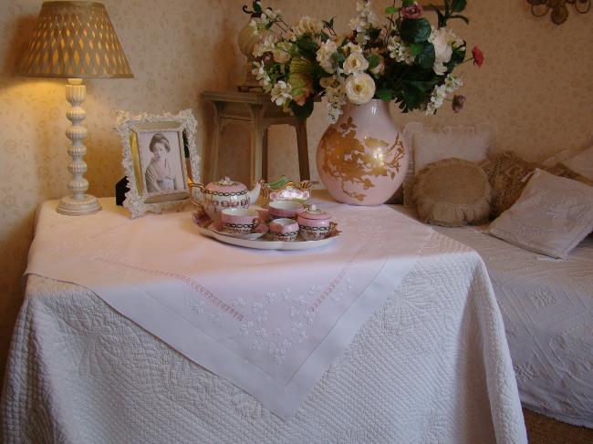 So sweet tablecloth with quantity of hand-embroidered clovers, circa 1915