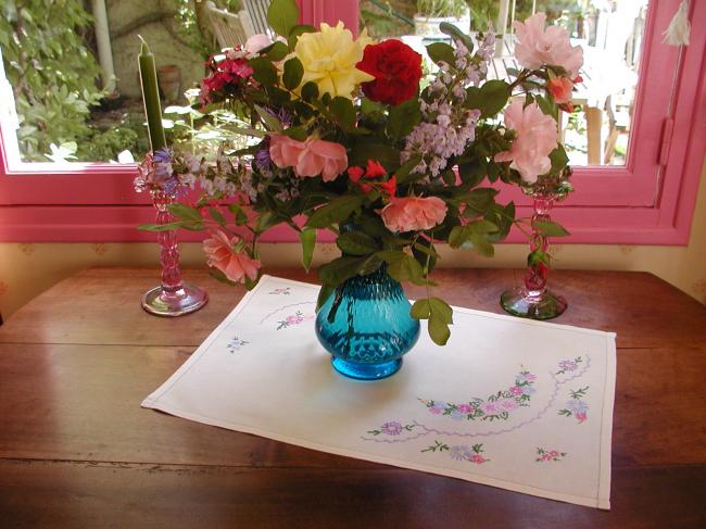 Lovely tray mat with hand embroidered flowers with acidulous colors