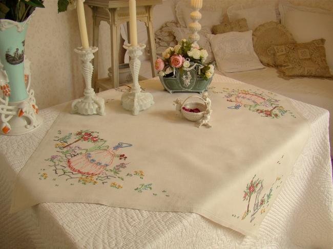 Lovely tablecloth with hand-embroidered crinoline lady and sundial in garden