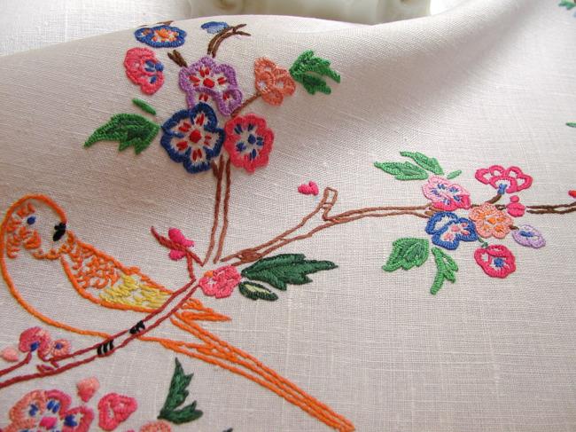 So sweet tablecloth with hand-embroidered parakeets in blooming tree