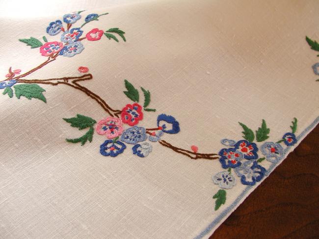 So sweet tablecloth with hand-embroidered parakeets in blooming tree