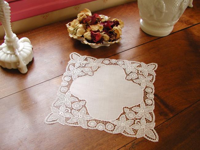 Gorgeous doily in fine batiste with chemical lace depicting clematites