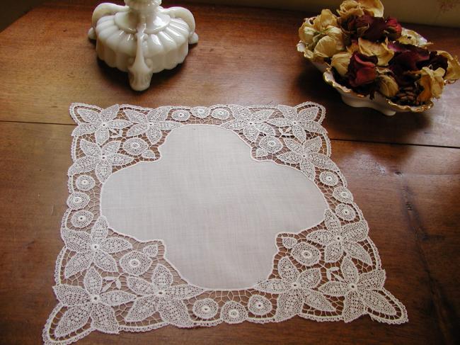 Gorgeous doily in fine batiste with chemical lace depicting clematites