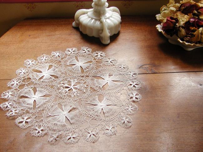 Gorgeous round doily in fine Nanduti lace