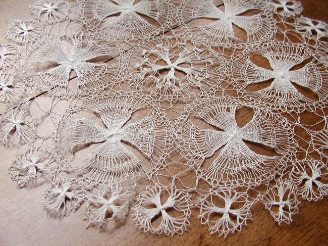 Gorgeous round doily in fine Nanduti lace