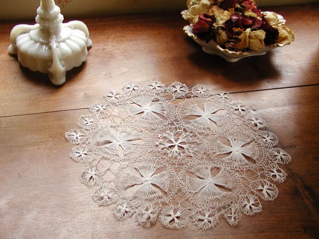 Gorgeous round doily in fine Nanduti lace