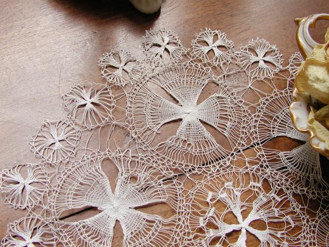 Gorgeous round doily in fine Nanduti lace