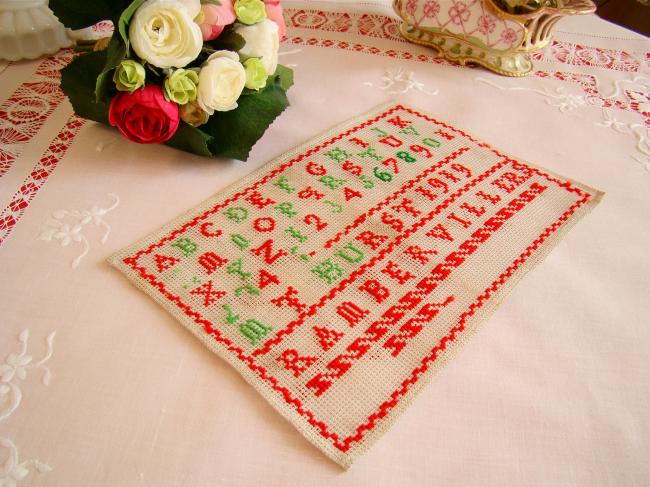 Lovely sampler made in red and green cross stitches, circa 1919, at Ramberviller