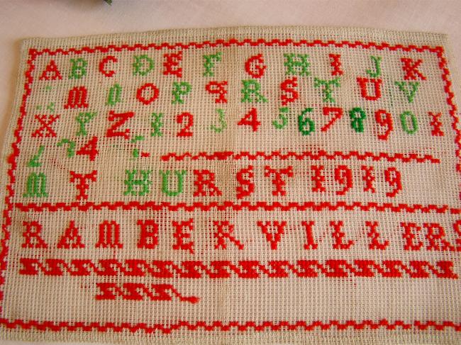 Lovely sampler made in red and green cross stitches, circa 1919, at Ramberviller