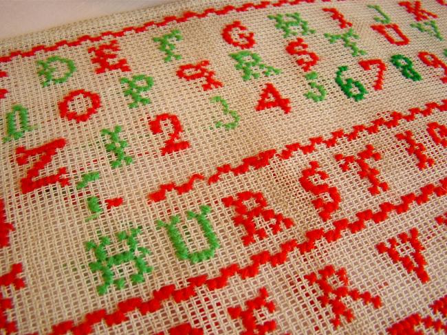 Lovely sampler made in red and green cross stitches, circa 1919, at Ramberviller