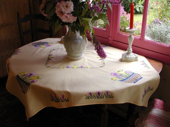 Adorable tablecloth with vibrant coloured and  hand-embroidered crocus