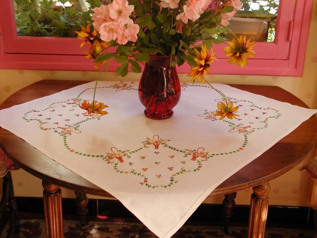 Lovely tablecloth with hand-embroidered coloured baskets of flowers