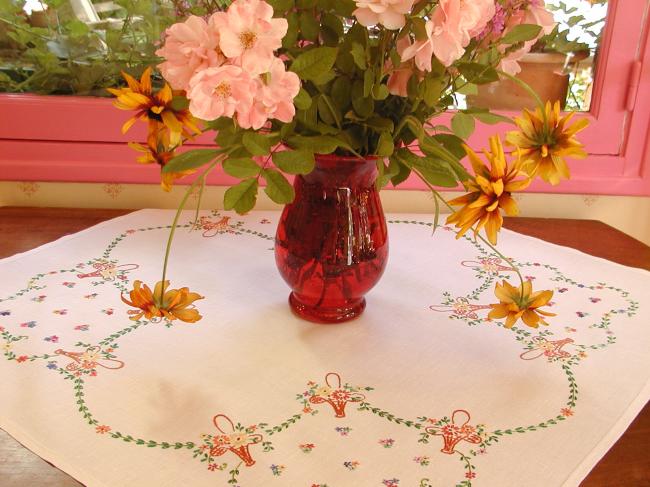 Lovely tablecloth with hand-embroidered coloured baskets of flowers