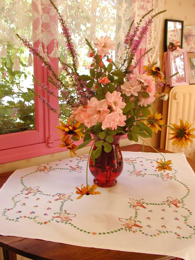 Lovely tablecloth with hand-embroidered coloured baskets of flowers