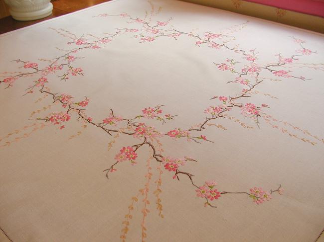 Enchanting small tablecloth with hand-embroidered blooming apple tree flowers