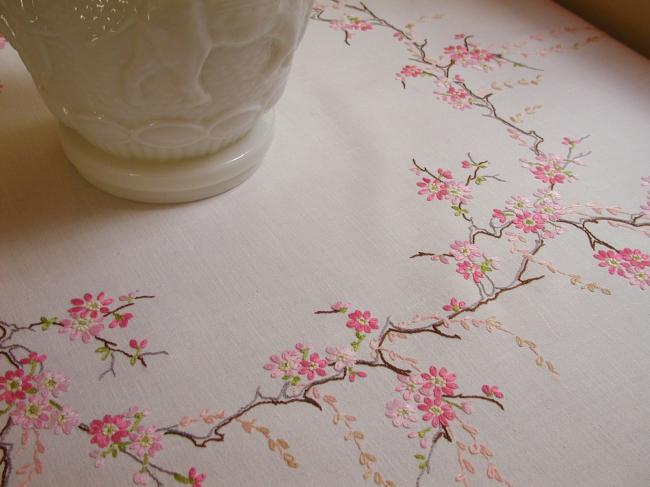 Enchanting small tablecloth with hand-embroidered blooming apple tree flowers