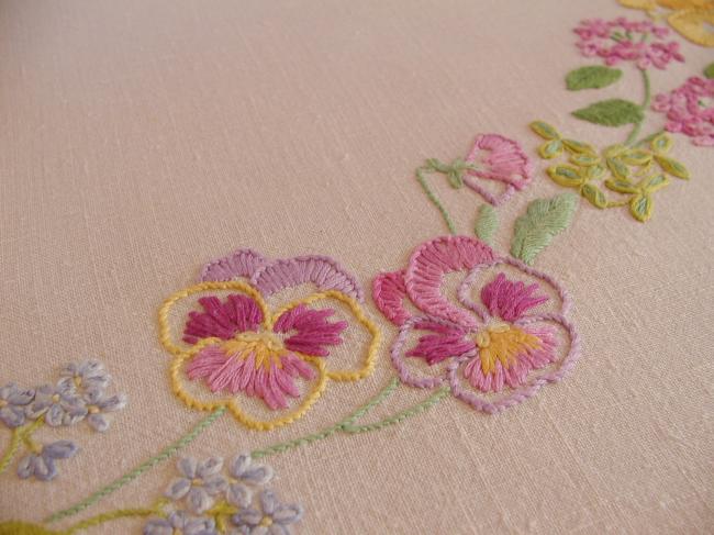 Breathtaking tablecloth with hand-embroidered garland of spring flowers