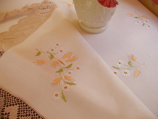 Enchanting tablecloth withhand-embroidered white daisies and wheat, crochet edge