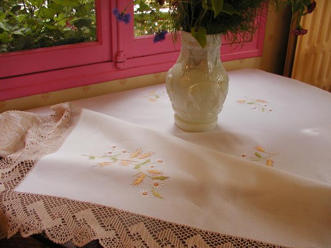 Enchanting tablecloth withhand-embroidered white daisies and wheat, crochet edge