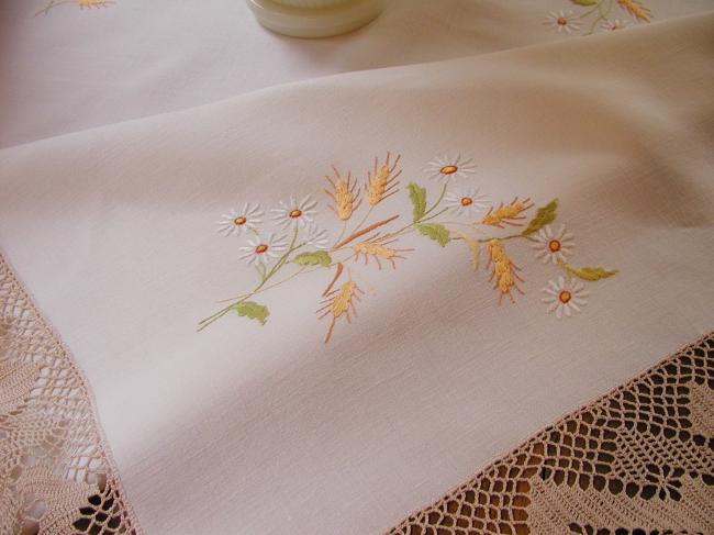 Enchanting tablecloth withhand-embroidered white daisies and wheat, crochet edge