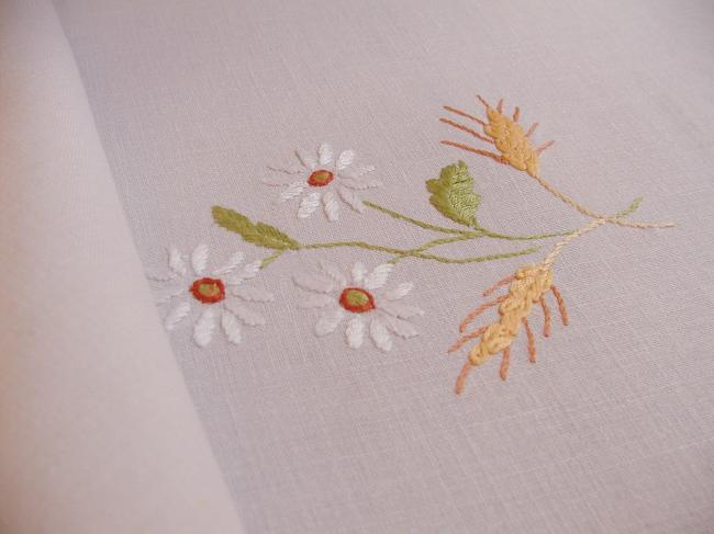 Enchanting tablecloth withhand-embroidered white daisies and wheat, crochet edge