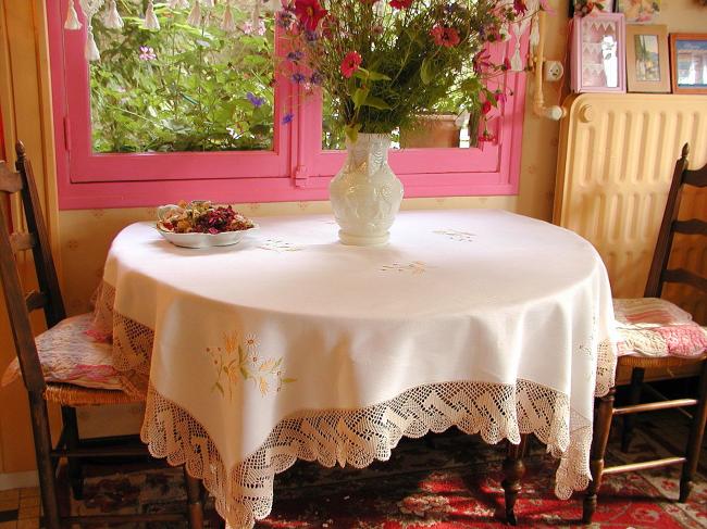 Enchanting tablecloth withhand-embroidered white daisies and wheat, crochet edge