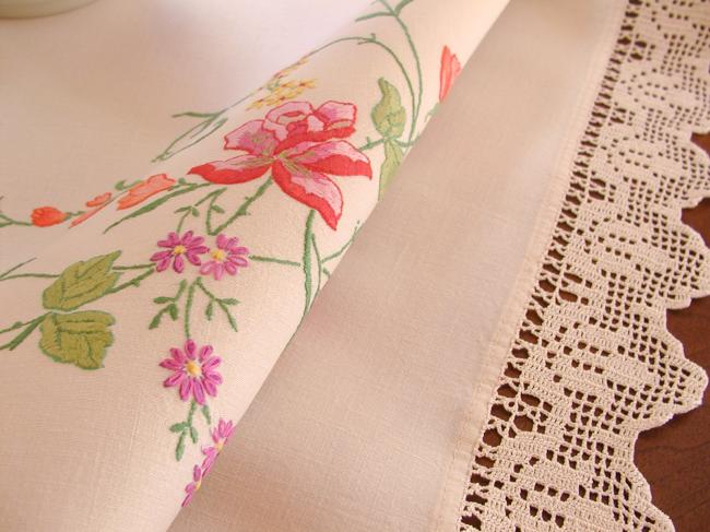 Really breathtaking tablecloth with hand-embroidered flowers and lace edging