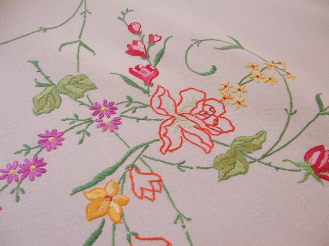 Really breathtaking tablecloth with hand-embroidered flowers and lace edging