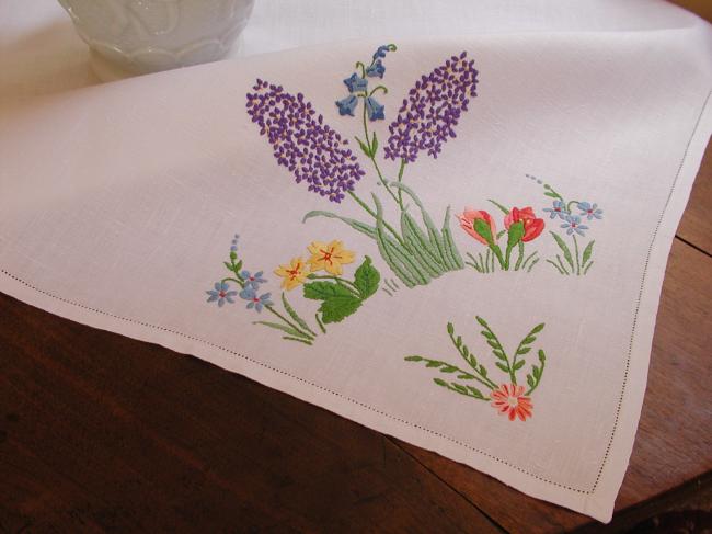 Lovely tablecloth with hand-embroidered hyacinths, crocus and spring flowers