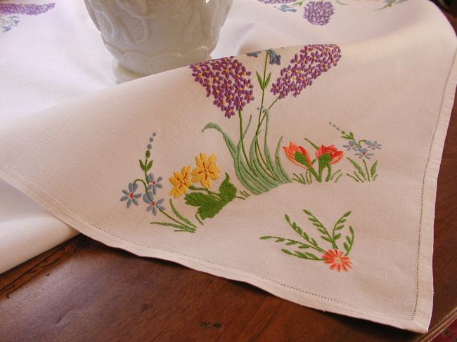 Lovely tablecloth with hand-embroidered hyacinths, crocus and spring flowers