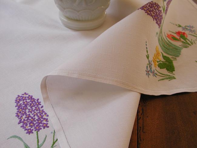 Lovely tablecloth with hand-embroidered hyacinths, crocus and spring flowers