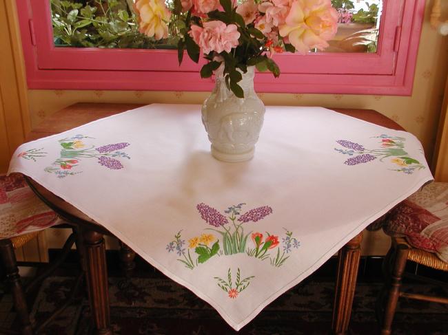 Lovely tablecloth with hand-embroidered hyacinths, crocus and spring flowers