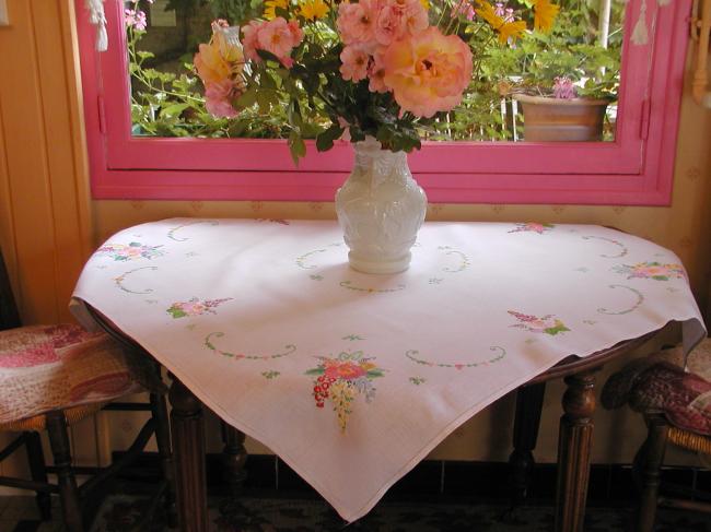 Gorgeous tablecloth with hand-embroidered bouquet of flowers