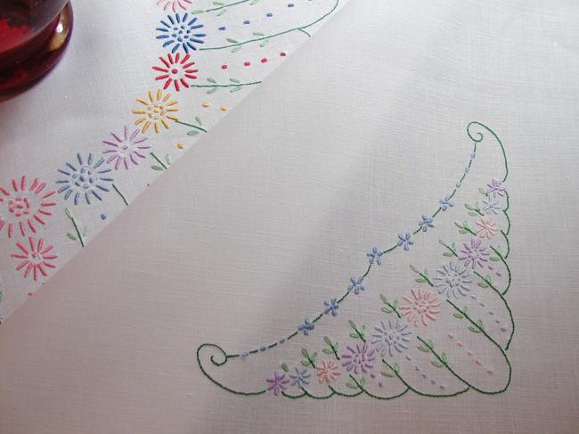 Really lovely tablecloth with hand-embroidered flowers and lace edging