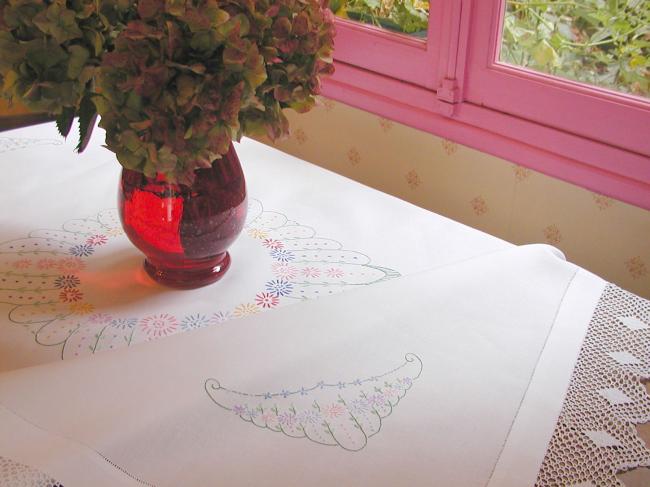 Really lovely tablecloth with hand-embroidered flowers and lace edging