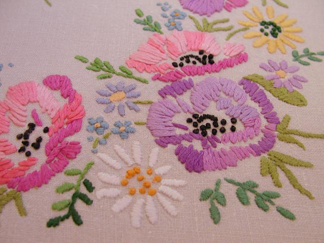 Breathtaking tablecloth with hand-embroidered  bouquets of spring flowers